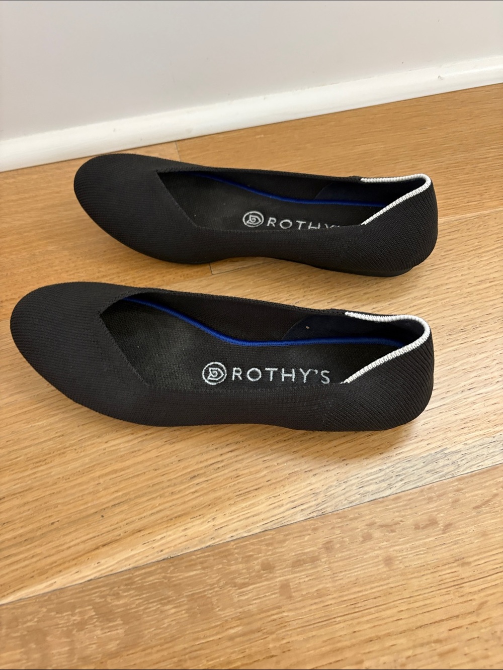 Rothy's Black Women's Slip-On Ballet Flats with White Trim